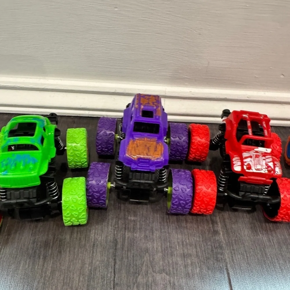 NWOT Monster Truck Toy Set - Green, Purple, Red, and Orange Kids Boys- 4 Cars